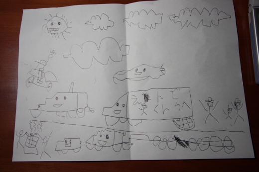 雲や乗り物が描かれた子供の手描きイラスト全体