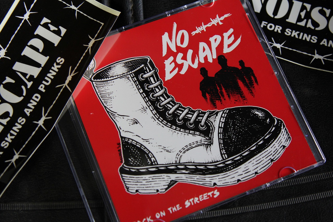 鳥取のパンクバンドNO ESCAPEのCDジャケットとプレイヤー